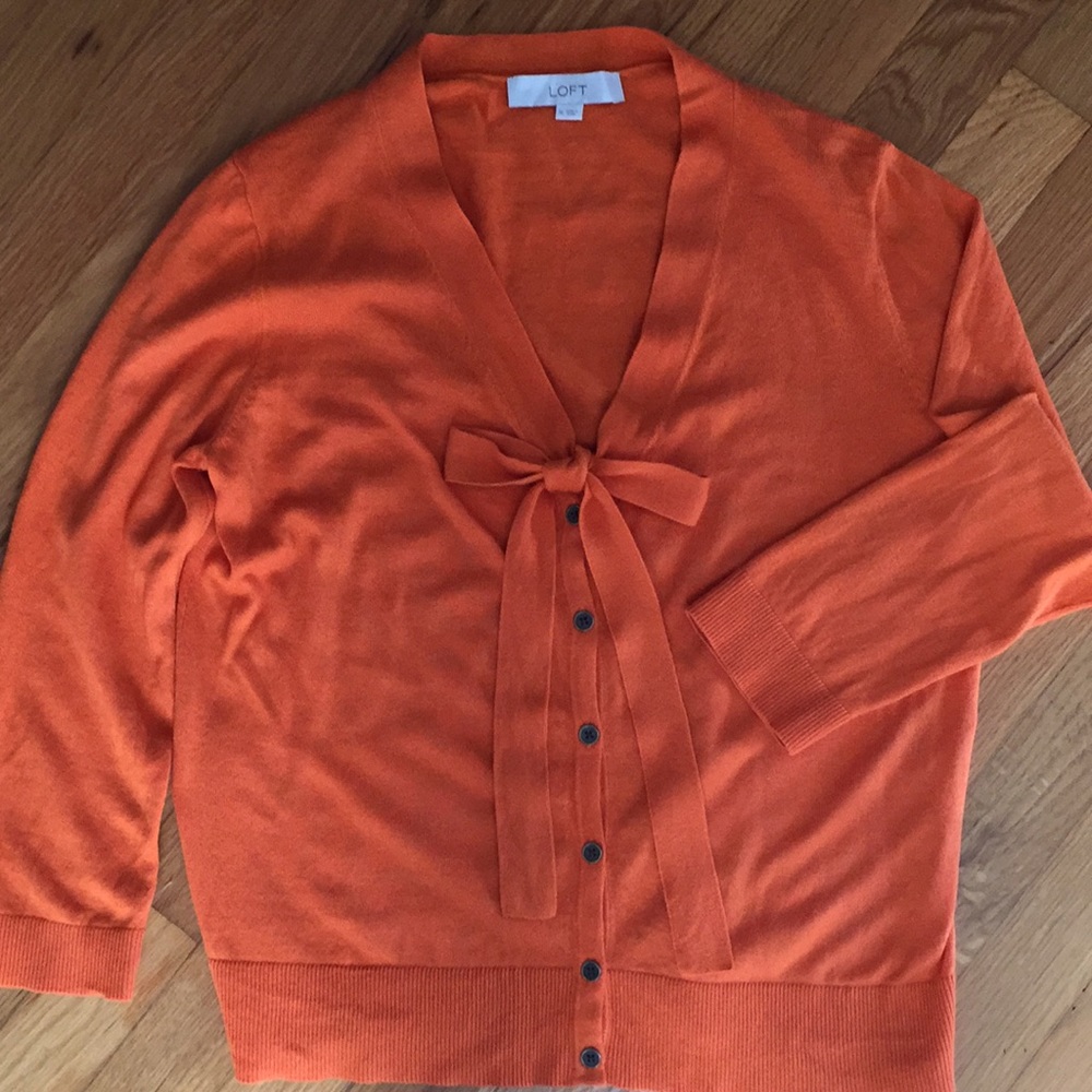 Orange cardigan sweater